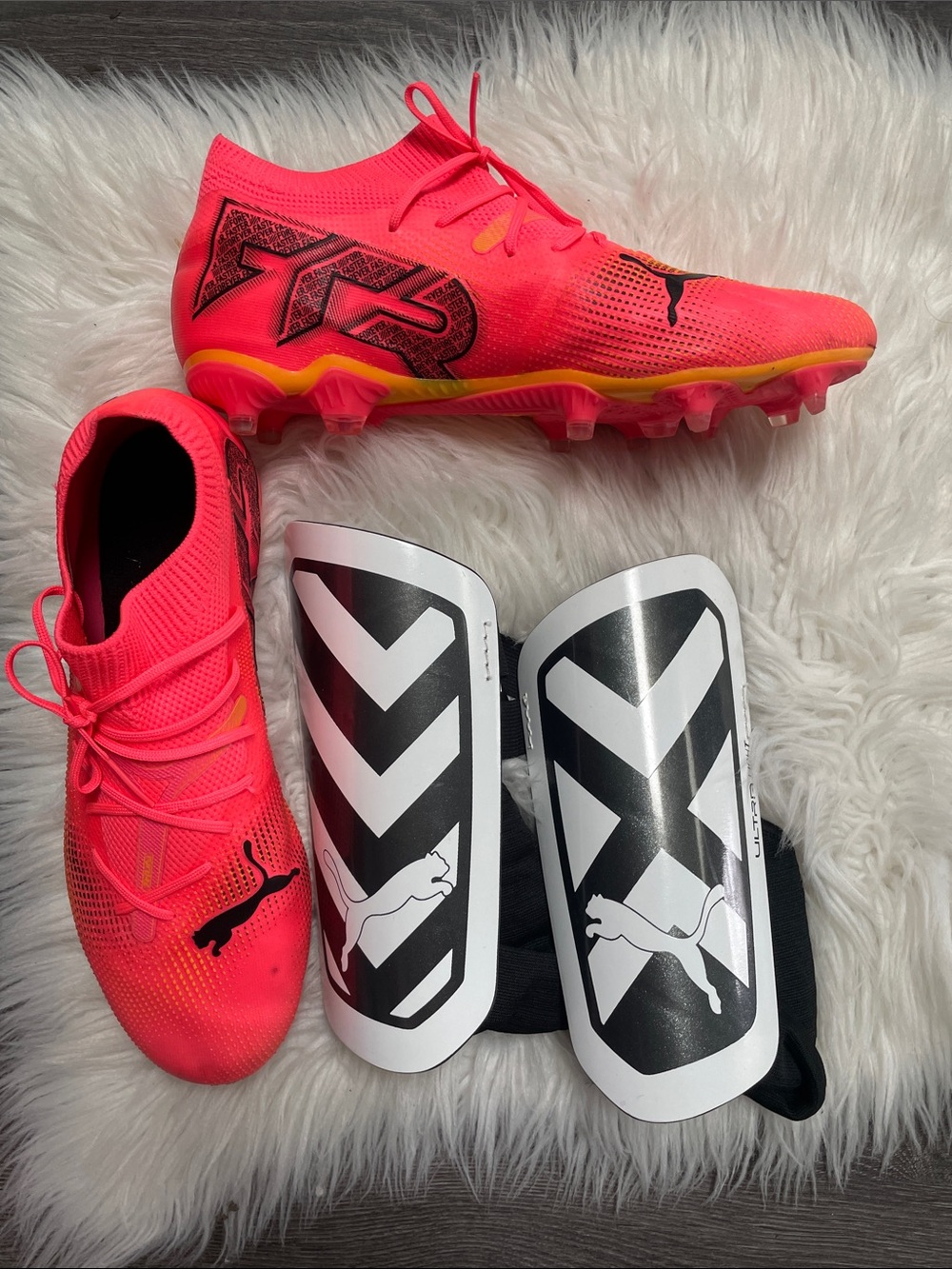 Puma Neon Pink Soccer Cleats with Black & White Shin Guards